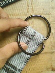 两个环的腰带系法视频